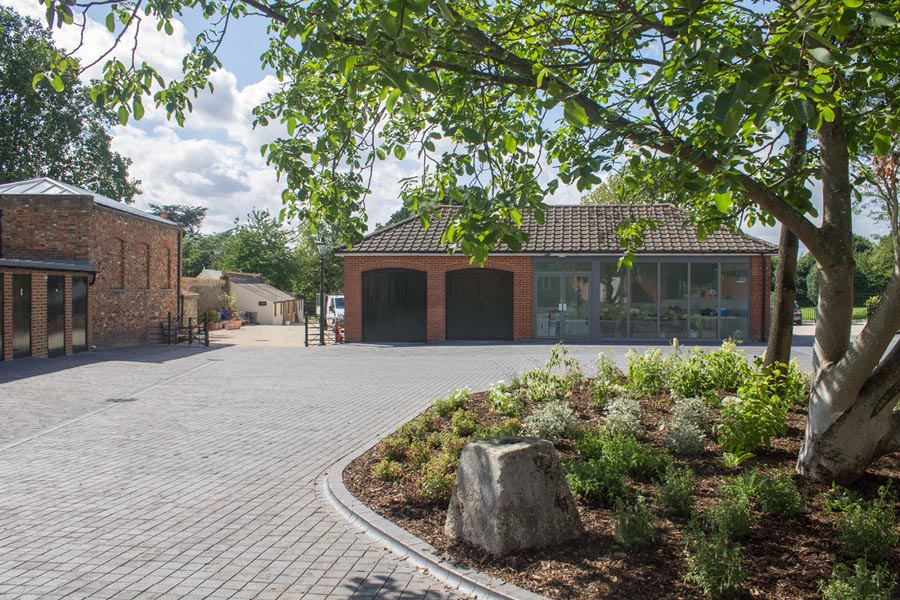 New cafe surrounds the restored stable yard at Langston Gardens